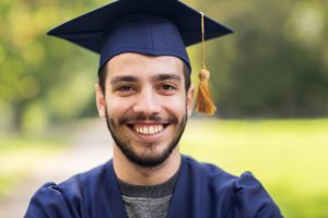 close up of student or bachelor in mortar board